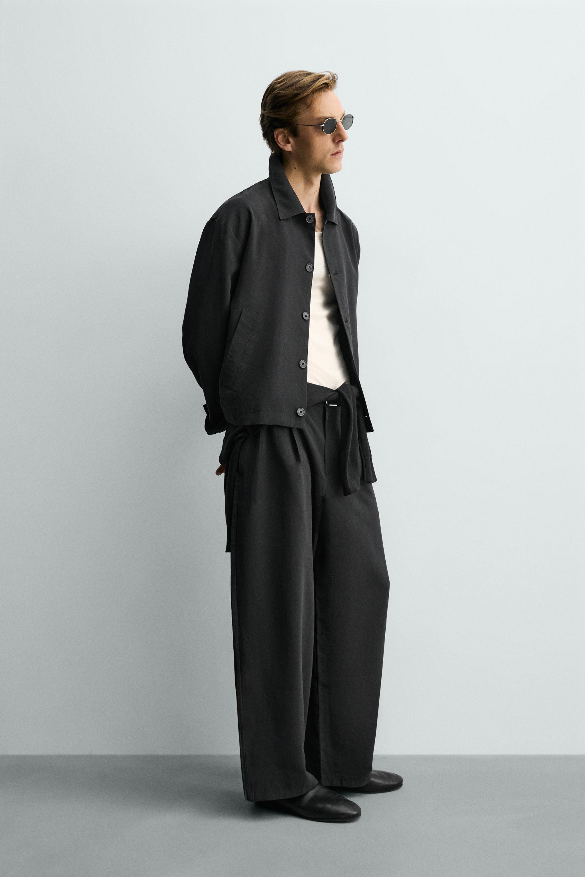 FLOWY PLEATED PANTS